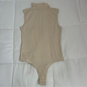 House of CB. Bodysuit in M/L